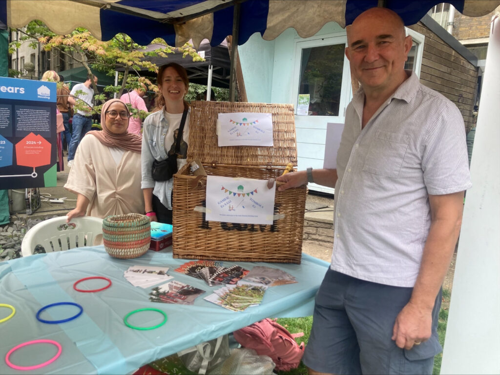 Soho Housing Team at Soho Fete July 2024 with game on stall